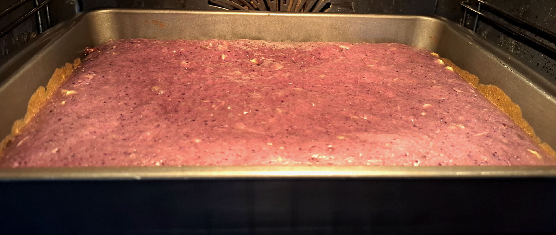 Cherry and Almond Blondies, Variation two baking in the oven