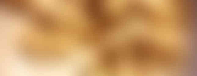 Tossing gnocchi in semolina. Image to accompany recipe for Spinach and mozzarella baked gnocchi on the food blog Forays into Food