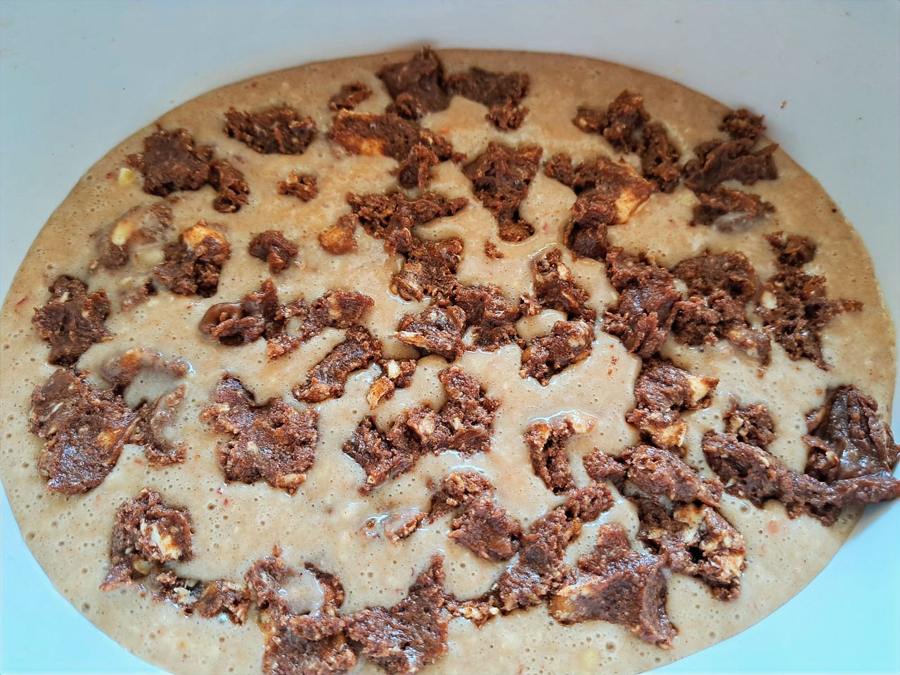Cake batter with the crumble caramel topping ready to go in the oven. Find recipe here!