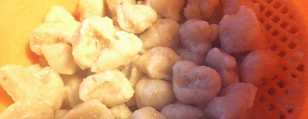 Draining gnocchi. Image to accompany the recipe for Spinach and Mozzarella Baked Gnocchi on the food blog Forays into Food