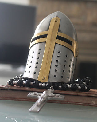 Knight's helmet and cross