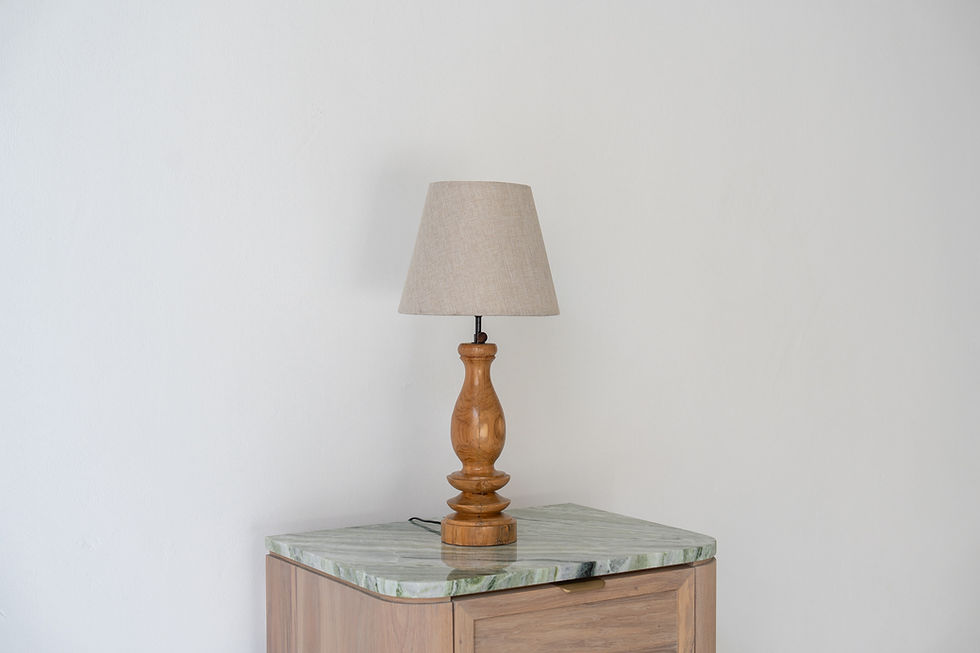 Thumbnail: Solid teak wood table lamp styled on a bedside table