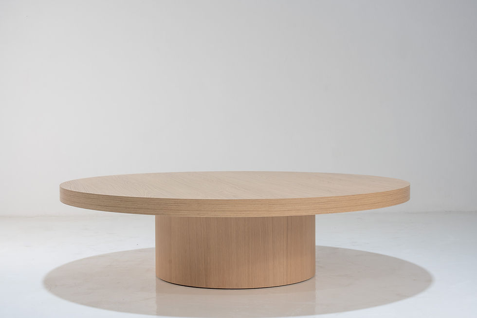 Thumbnail: Aster oak coffee table in Dubai with round pedestal design and premium oak finish by Adams Furniture