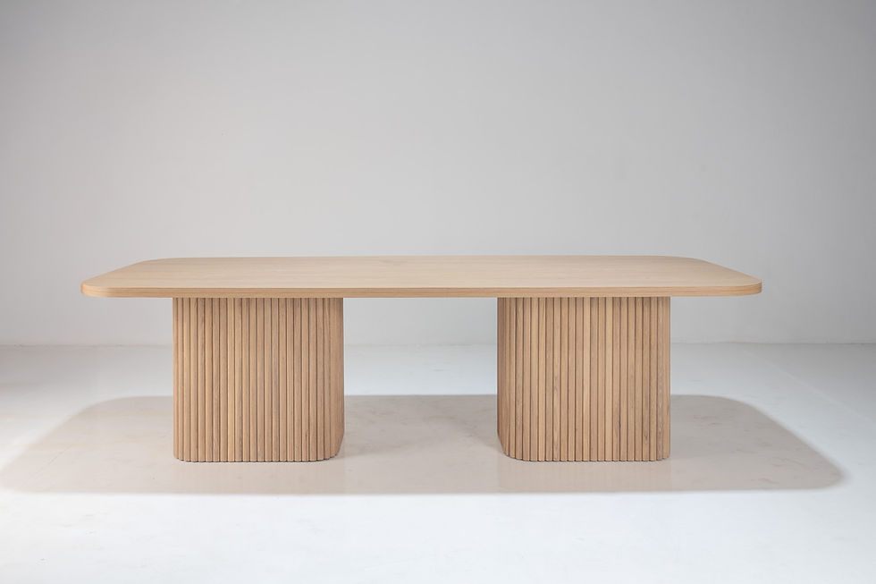Thumbnail: Mysa solid oak dining table in Dubai with fluted pedestal base by Adams Furniture