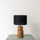 Thumbnail: Teak bedside table lamp with drum shade for warm ambient lighting