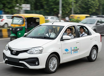 Corporate Employees Travelling To Their Office With Rrego's Office Cab Service