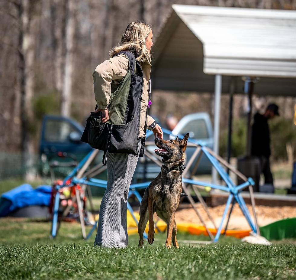 A woman with dog in her side