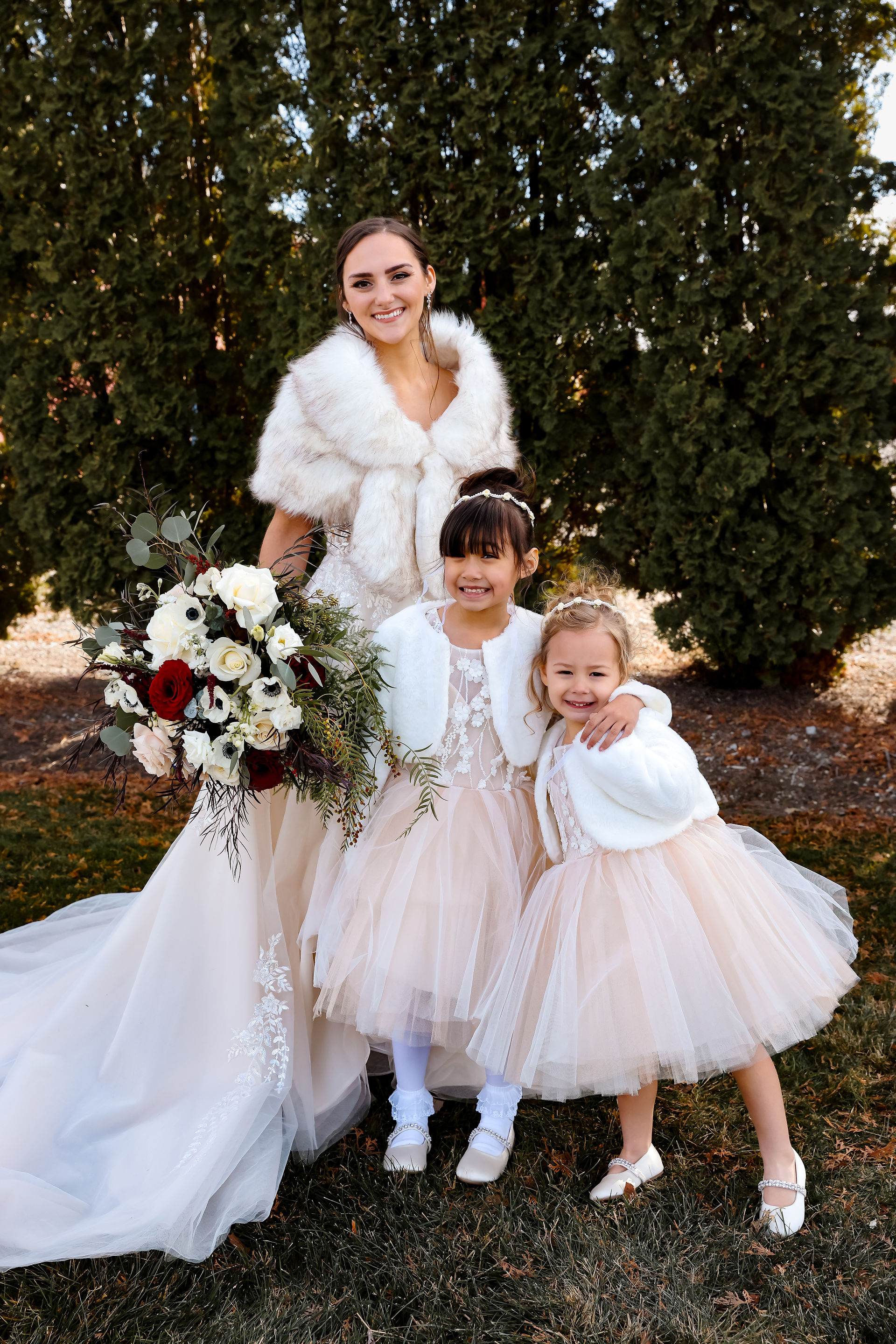 Bride with flower girls