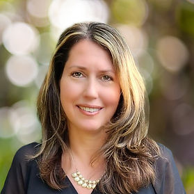 Portrait of Heather Miller, a compassionate Licensed Clinical Social Worker, in a calm setting that reflects her supportive and client-centered approach.