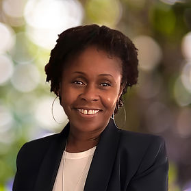 Portrait of Dr. Shaun Hutton, a compassionate therapist with a calm presence, reflecting her inclusive, trauma-informed approach to counseling