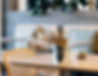 gray stainless steel cup with tissue on brown table_edited.jpg