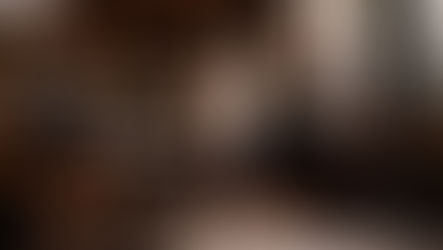 Model wearing Casmir brand athleisure clothing in cafe