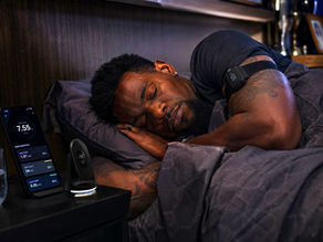 Tech-enhanced sleep in a cozy bedroom