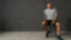 Model posing in a Studio wearing Casmir tshirt and shorts, showcasing sports fashion photo shoot
