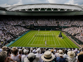 Tennis match in a grand stadium