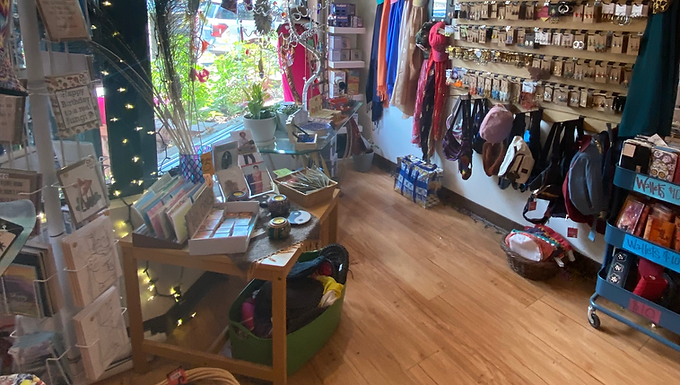 A trendy boutique offering clothing, gifts, accessories, and Colorado-inspired items with a youthful, modern vibe.