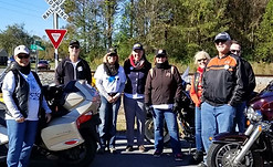Veterans gathered around motorcycles in preparation for the country's oldest consecutive Veterans Parade in Warsaw, NC.