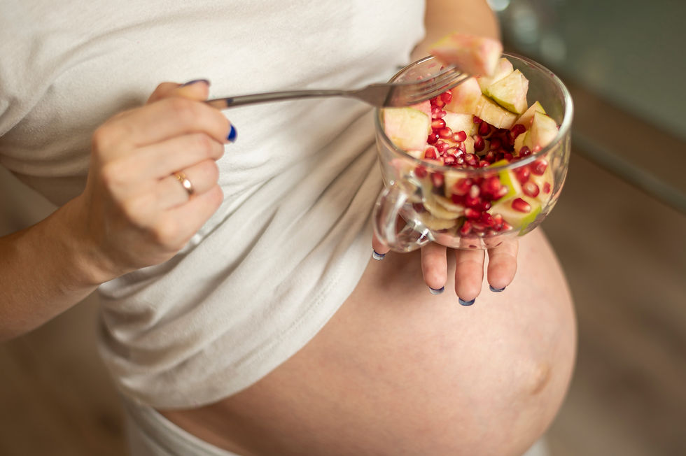 pregnant-woman-hands-holding-tasty-salad.jpg