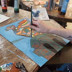 Someone painting the Liverbird inspired art piece
