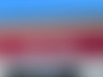 Red sign reading "Op Shop" and "Save the Children Australia." Text urges shoppers to help children. Clear blue sky in the background.