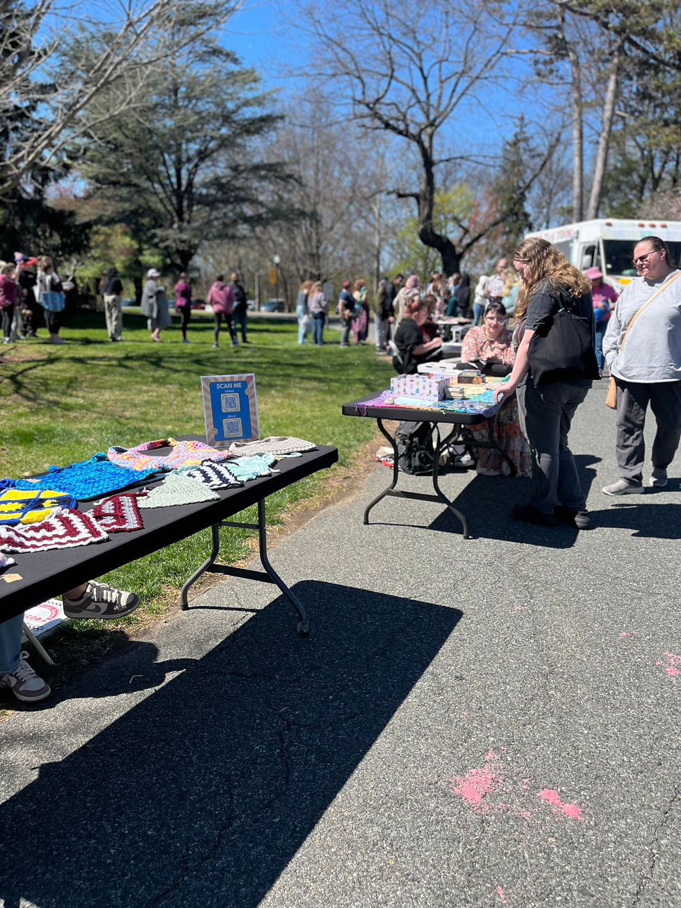 Local vendors display handmade crafts and artwork for students throughout the afternoon.