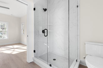 Interior of 803 Yancey Street in Durham North Carolina showing large glass shower