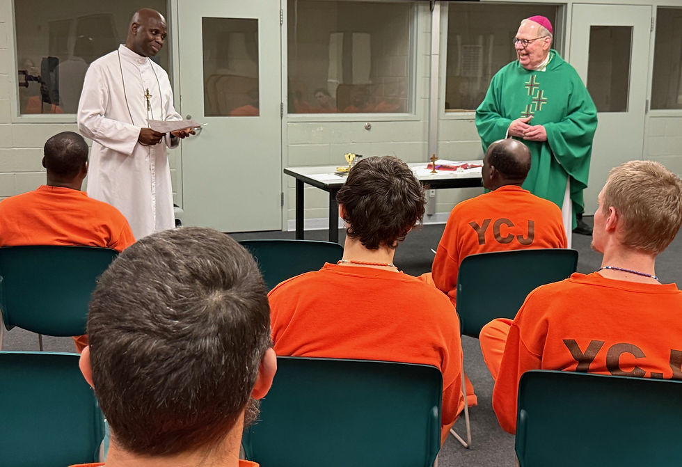 Brother Henry Monday, left, of the Brothers of Christian Instruction in Alfred, and Bishop Robert Deeley take part in a recent Mass at York County Jail.