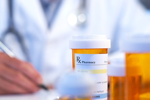 stock-photo-doctor-with-rx-prescription.jpg