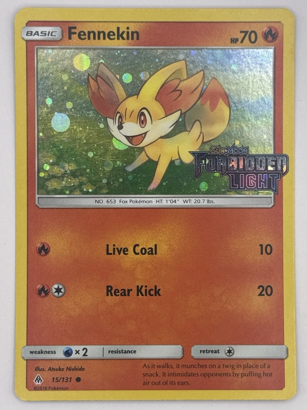 Sun & Moon - Promo 15/131 Fennekin (Stamped)