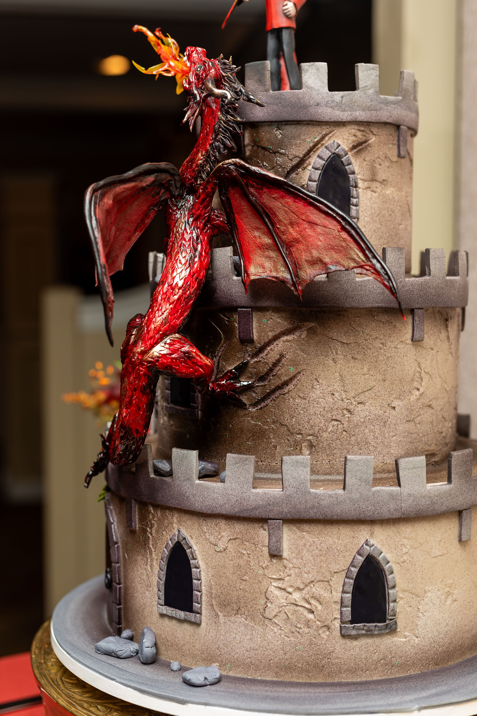 castle cake with fire breathing dragon