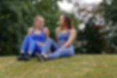 2 people wearing gym clothing