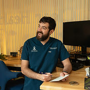 Dr. Jones in front of a computer used for virtual appointments and telehealth