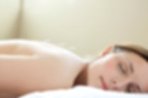 A woman is relaxed during an acupuncture treatment