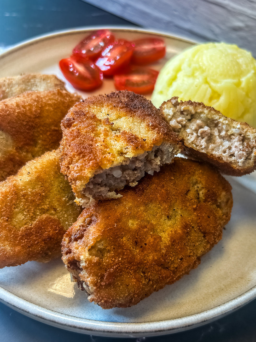 Close-up view of golden-brown Kadınbudu Köfte on a plate