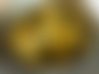 Classic potato salad with olive oil, lemon juice, fresh parsley, and chopped spring onions, served chilled