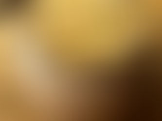 Nutella overnight oats in a glass jar, topped with cocoa powder and crushed hazelnuts for a quick and indulgent breakfast