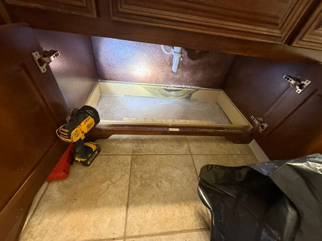 Cabinet base repair in progress in Keller TX