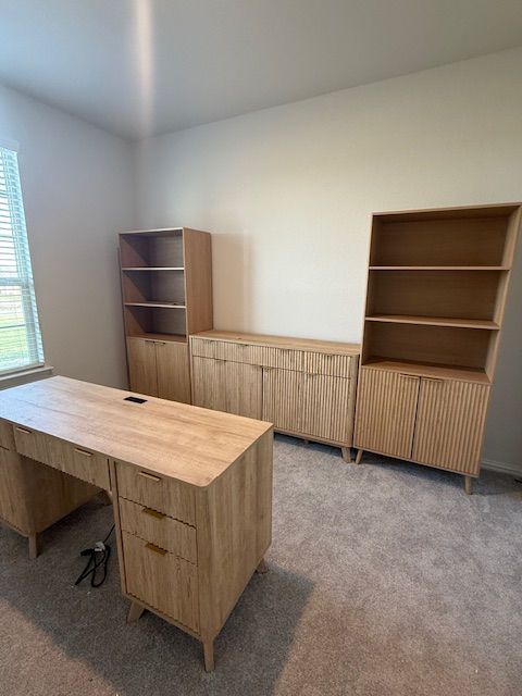 Finished room setup desk credenza and dual bookcases clean alignment