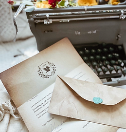 Image of writing faerie academy letter with wax seal stamp and typerwriter