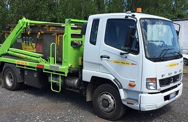 Eastern Skip Hire's green skip bin delivery truck in Kilsyth 3137