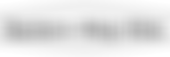 Rows of grapevines in an autumn vineyard in Coldstream, set against a backdrop of rolling mountains in the Yarra Valley.