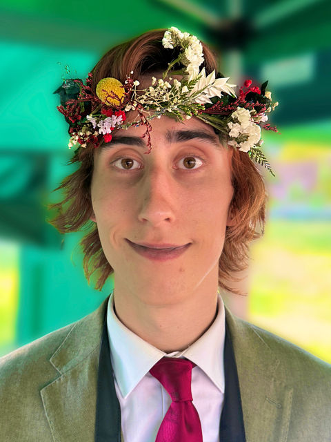 Guests wearing flower crowns created during a corporate event workshop