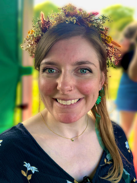 Guests wearing flower crowns created during a corporate event workshop cambridge