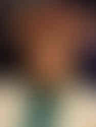 Detailed Halloween themed flower crown workshop with adult face painting for corporate events