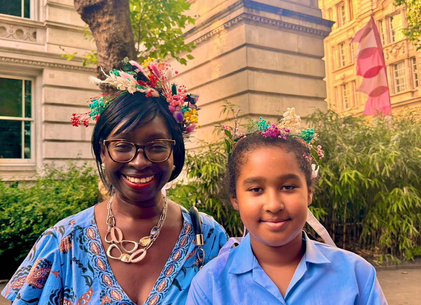 Mum & daughter at Culture Mile summer event creating their own flower crowns 
