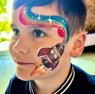 corporate event entertainment rainbow rocket face painting