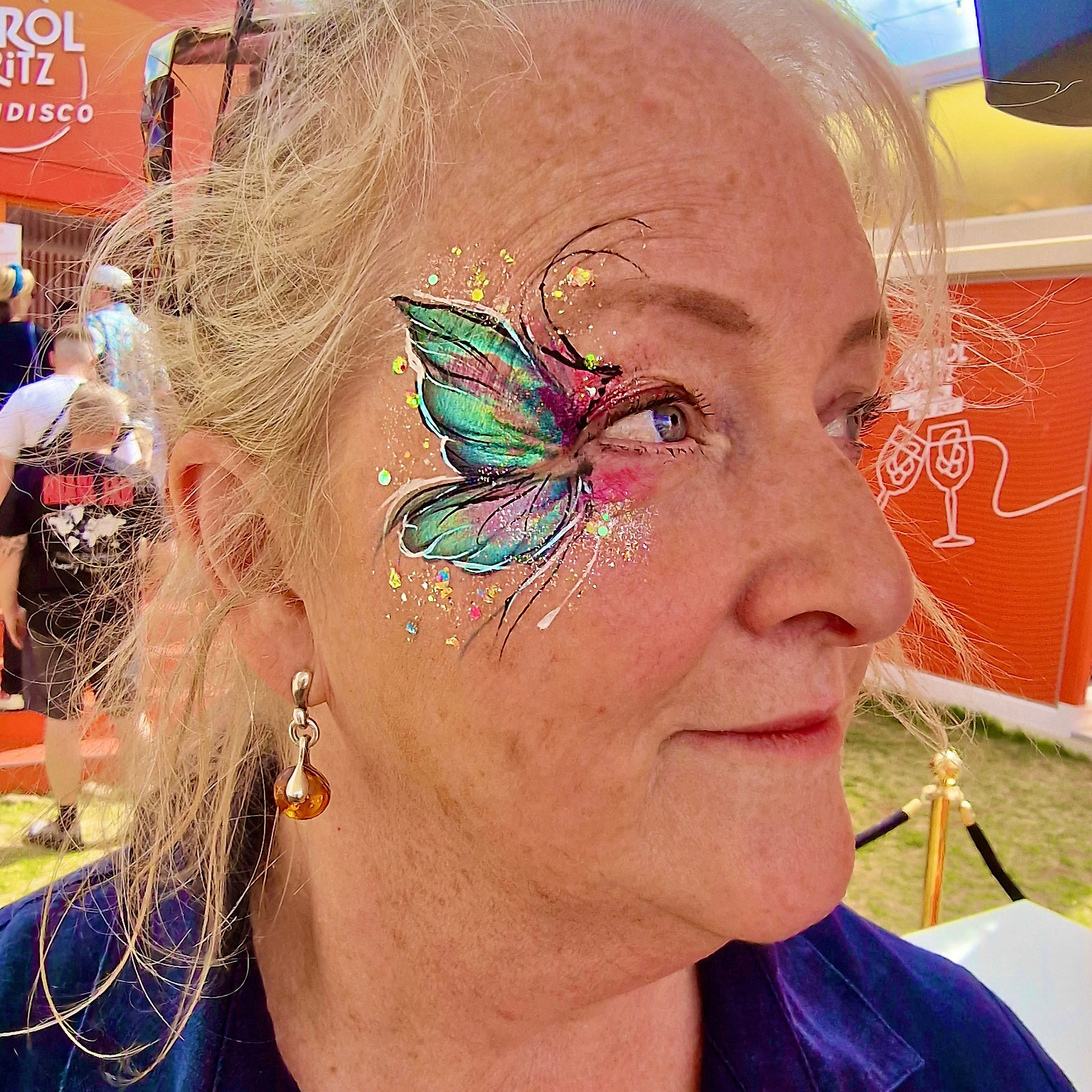 festival glitter butterfly face painting