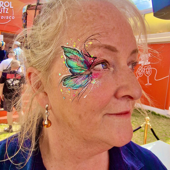 festival glitter butterfly face painting