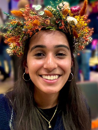 Autumn themed flower crown workshop with adult face painting for corporate events