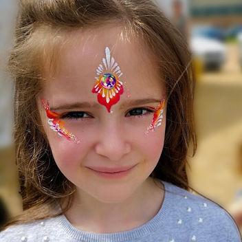 festival inspired girls glitter face painting glitter bar setup